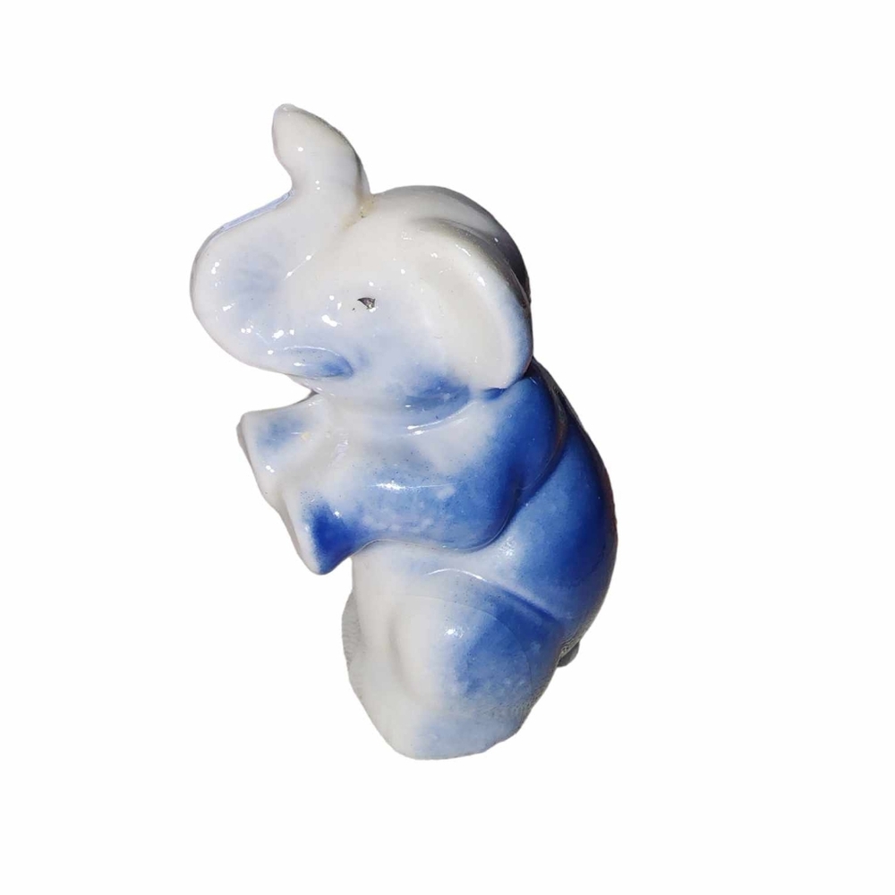 Vintage blue elephant figurine.